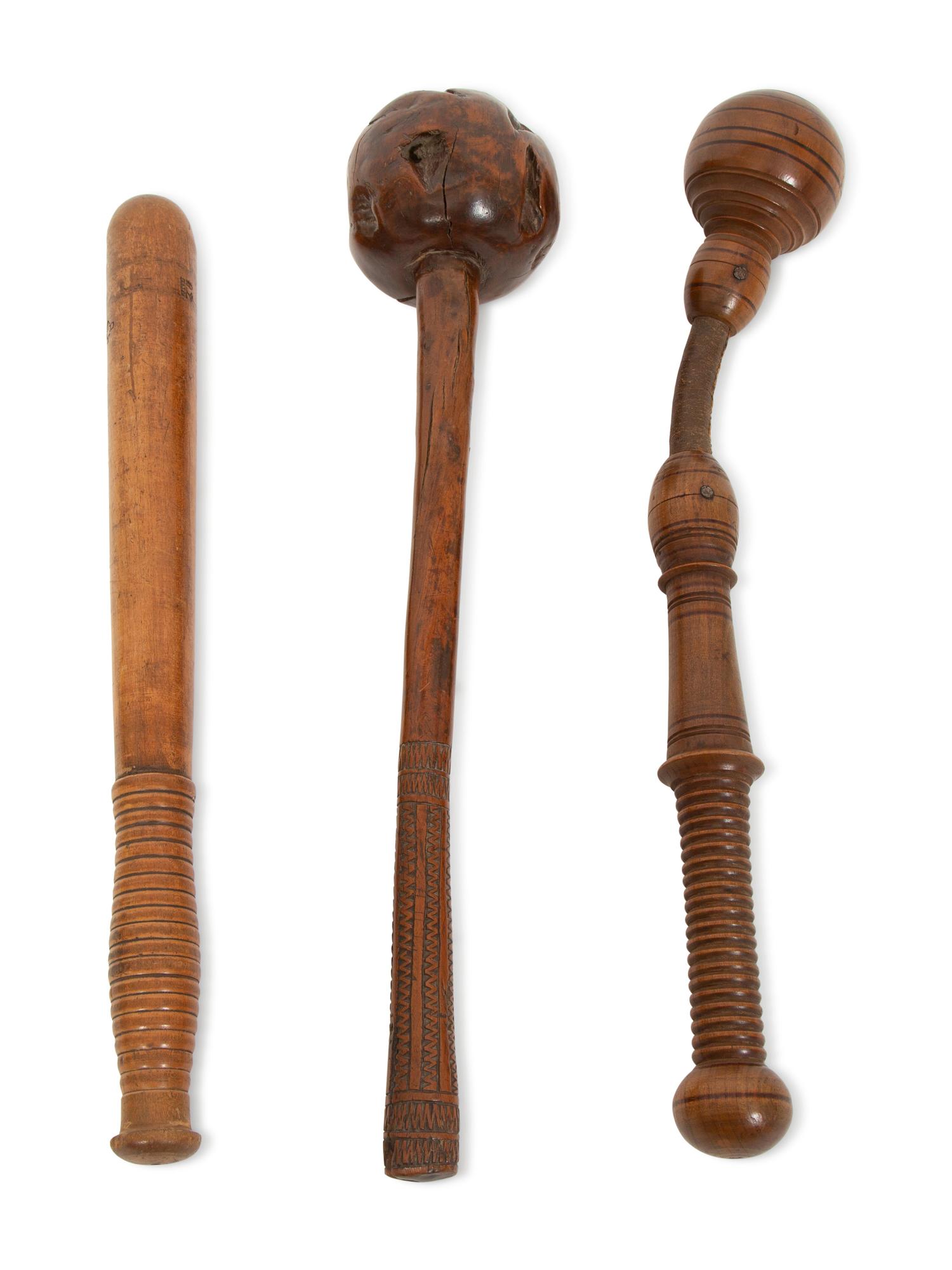 Three Carved Wood Clubs