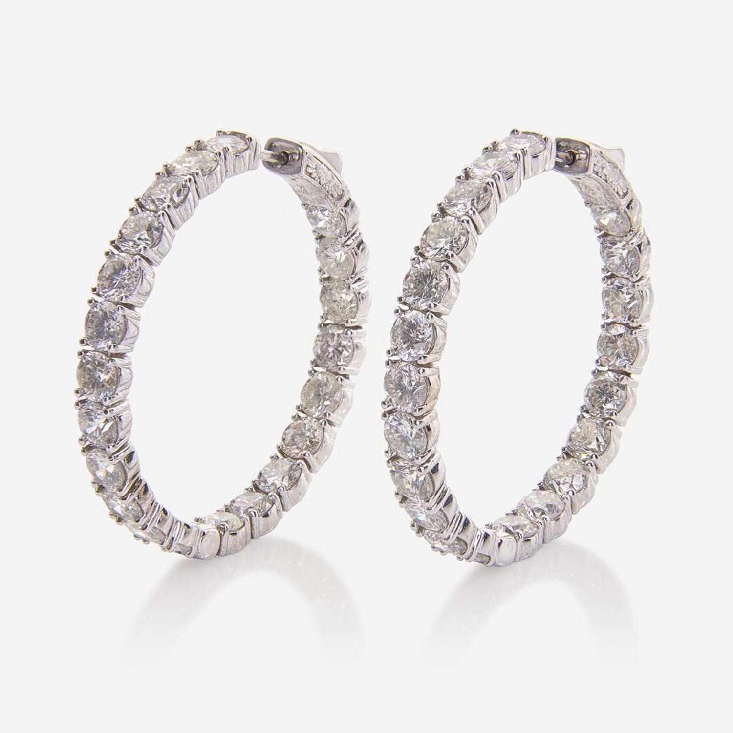 A Pair of 14K White Gold and Diamond Hoop Earrings