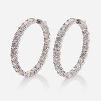 A Pair of 14K White Gold and Diamond Hoop Earrings