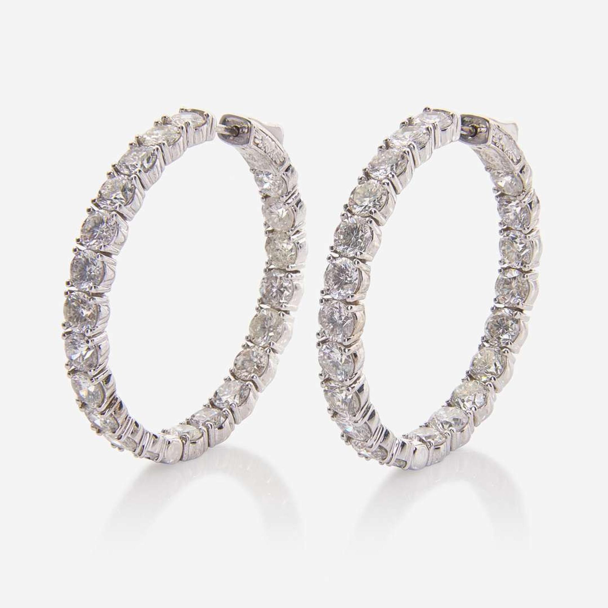 A Pair of 14K White Gold and Diamond Hoop Earrings