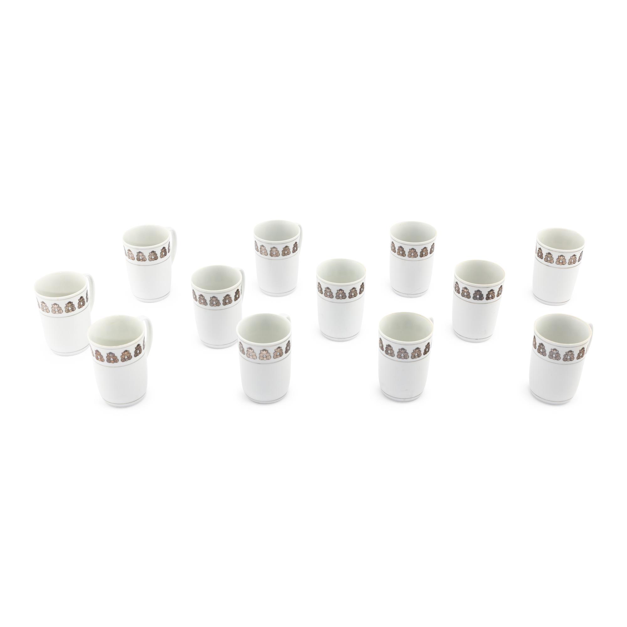 A Set of Twelve Georg Jensen Acorn Porcelain Coffee Mugs