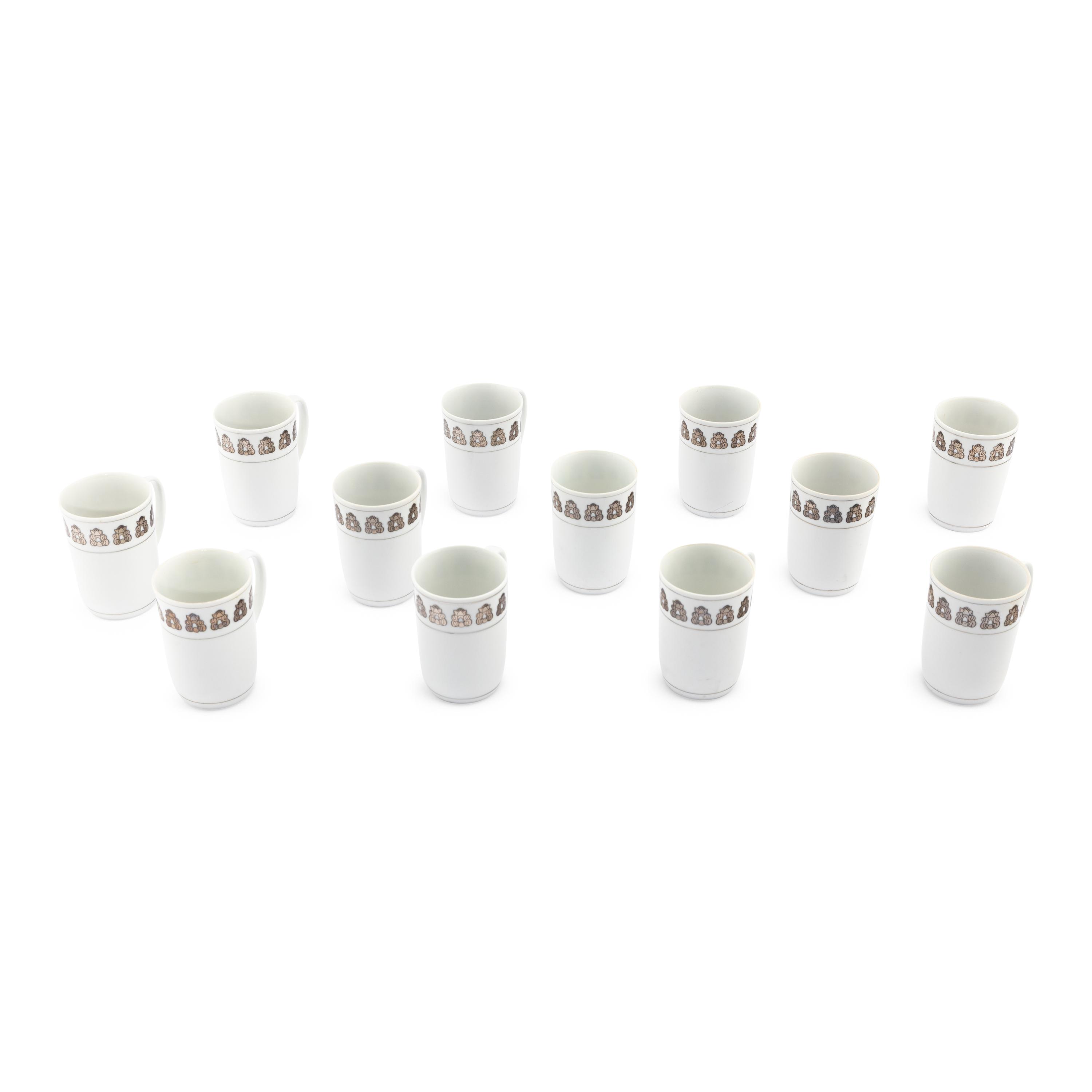 A Set of Twelve Georg Jensen Acorn Porcelain Coffee Mugs
