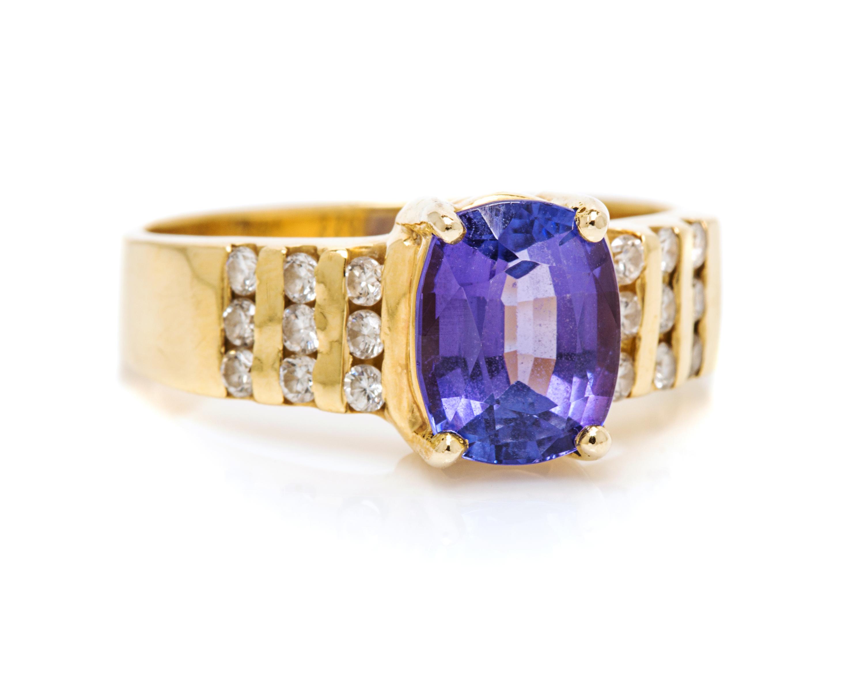 An 18 Karat Yellow Gold, Tanzanite and Diamond Ring, 4.30 dwts.