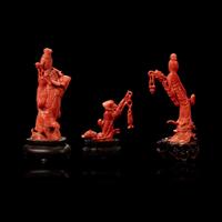 Three Chinese carved coral figural groups, meiren and peach, man and basket, meiren and flower