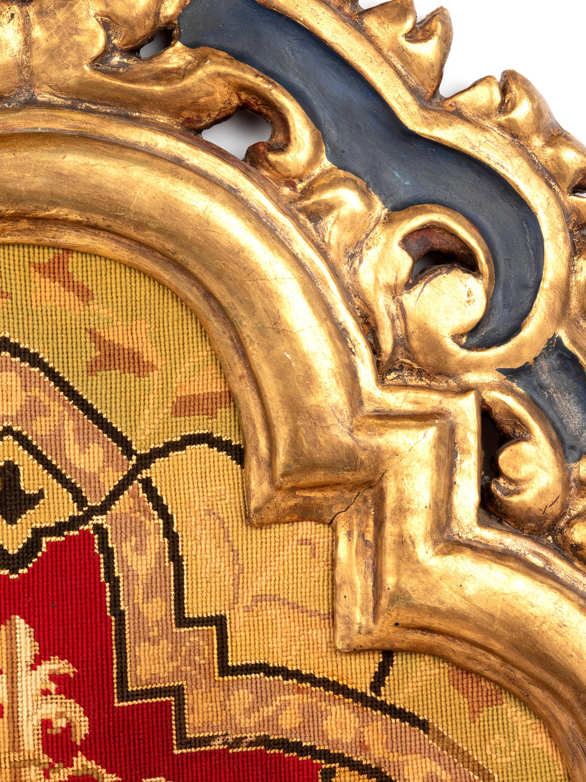 A Petit-Point Panel Set in a Painted and Parcel Gilt Frame