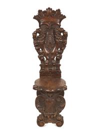 An Italian Renaissance Revival Sgabello Hall Chair