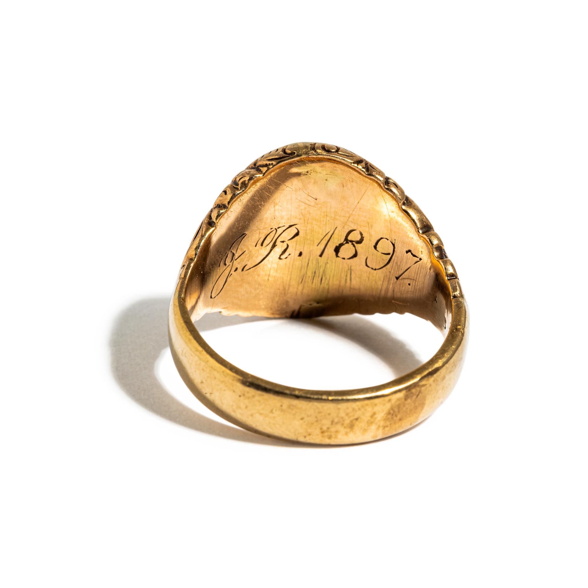 A Neoclassical Gold and Carnelian Finger Ring with the Portrait Head of a Woman