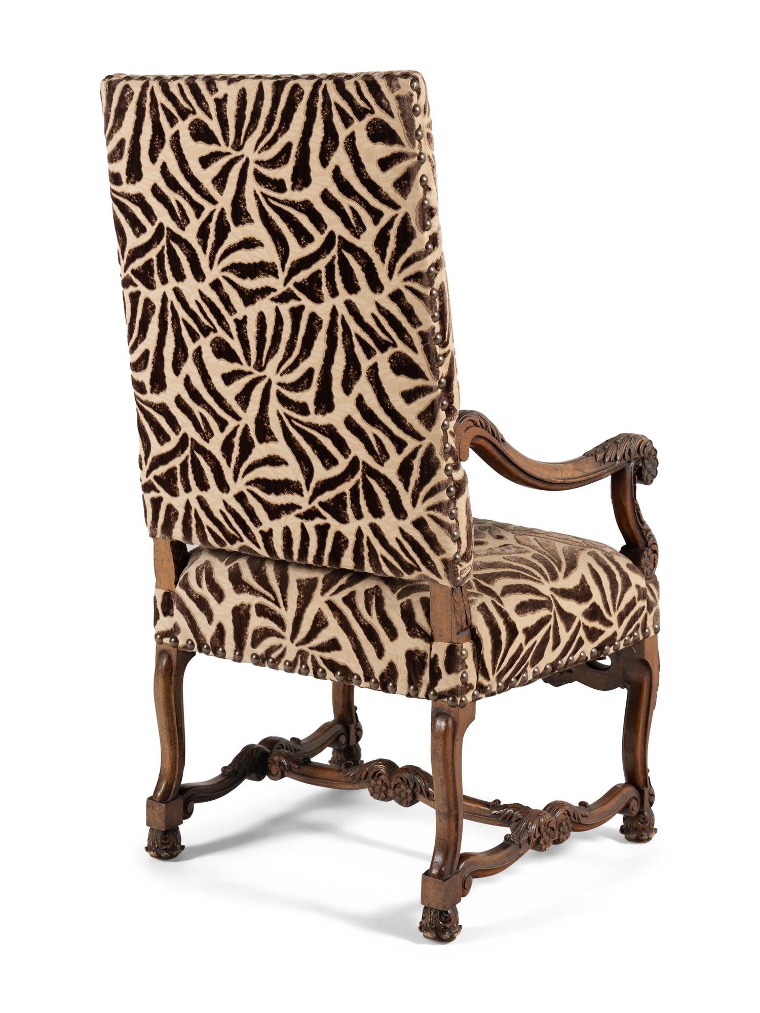 An Italian Rococo Revival Walnut Armchair