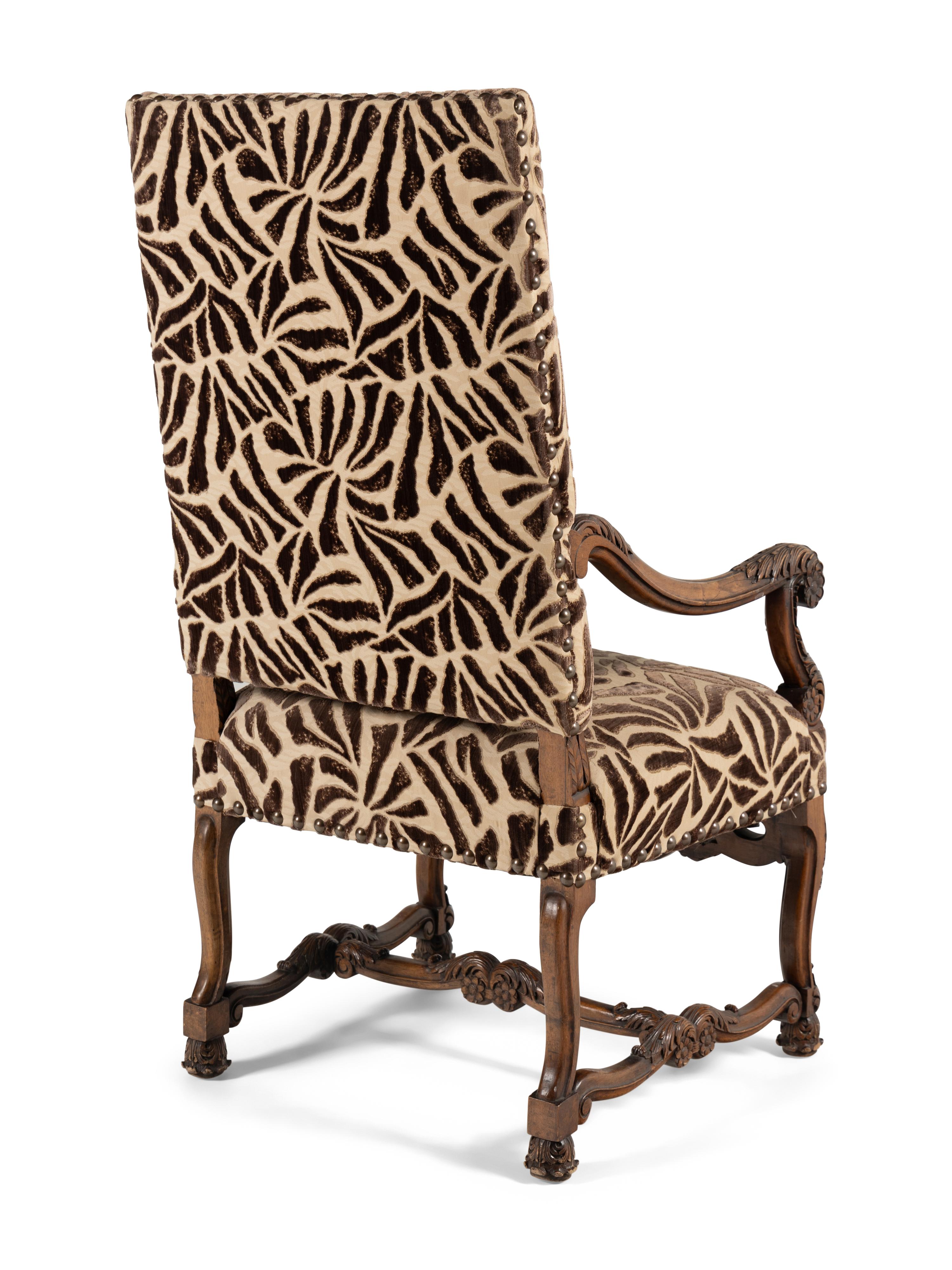 An Italian Rococo Revival Walnut Armchair