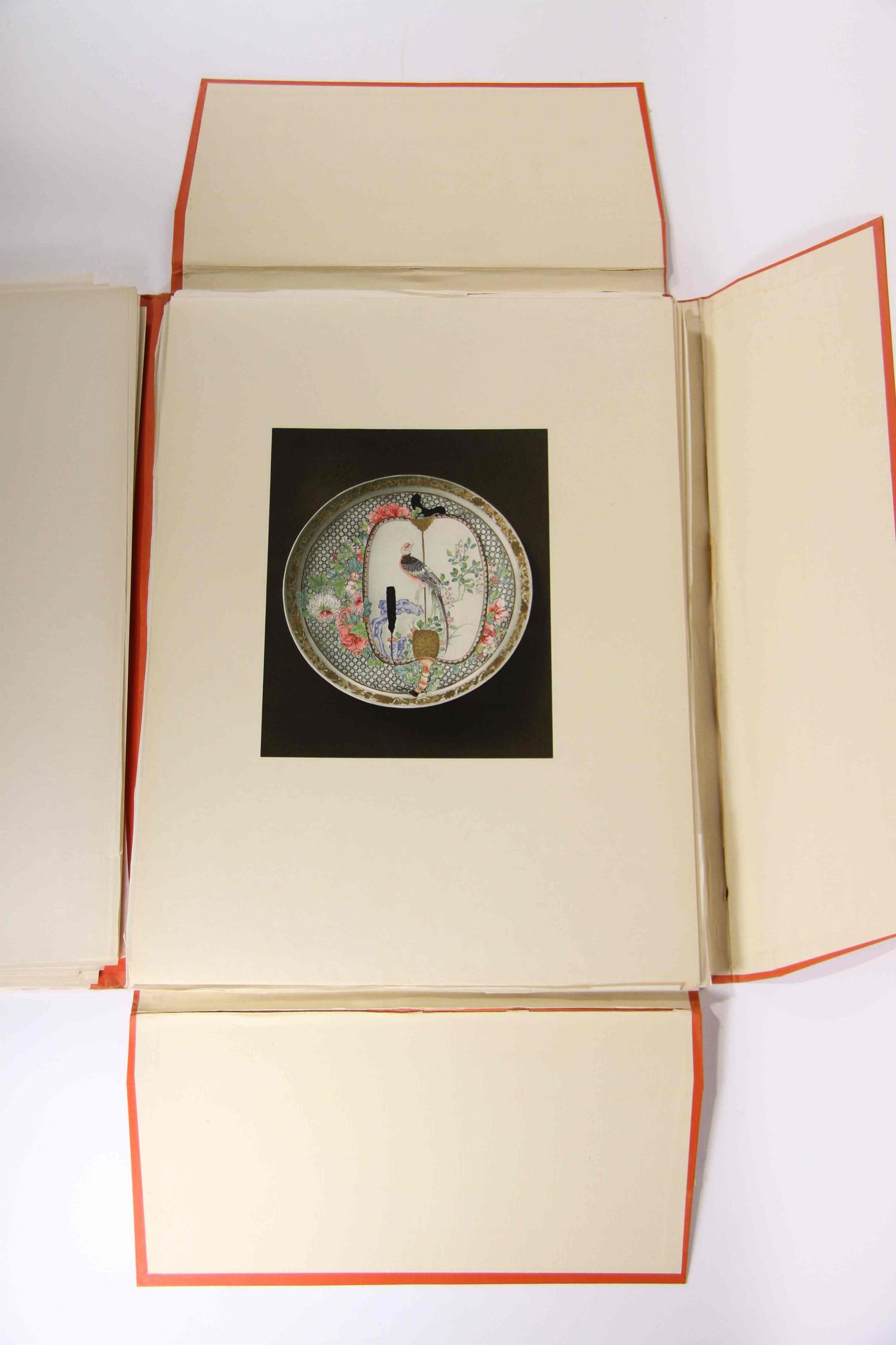 A Group of Four Ceramic Plates Height of tallest 22 1/2 inches.