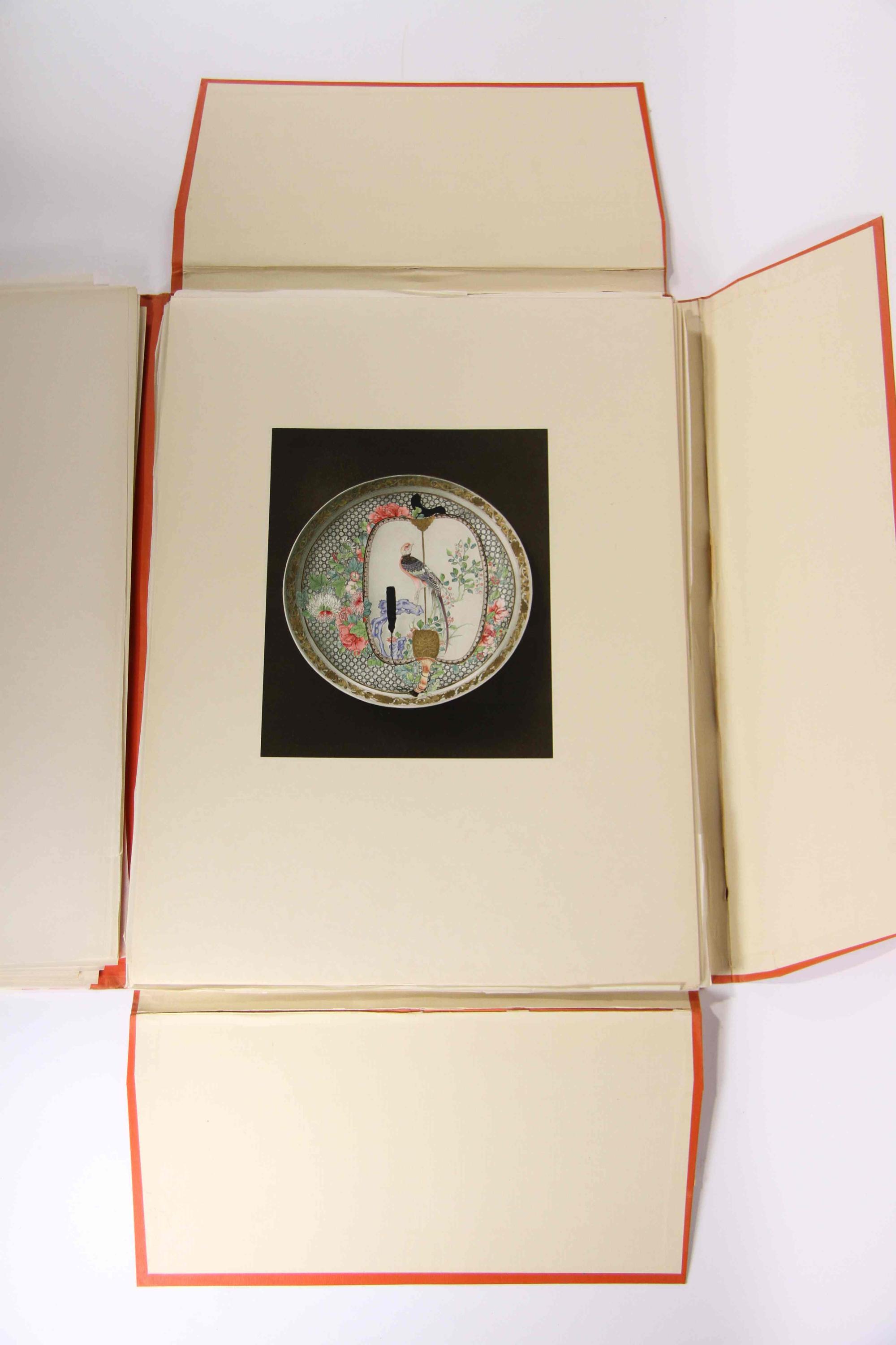 A Group of Four Ceramic Plates Height of tallest 22 1/2 inches.