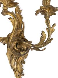 A Pair of Louis XV Style Gilt Bronze Three-Light Wall Sconces — 19TH/20TH CENTURY