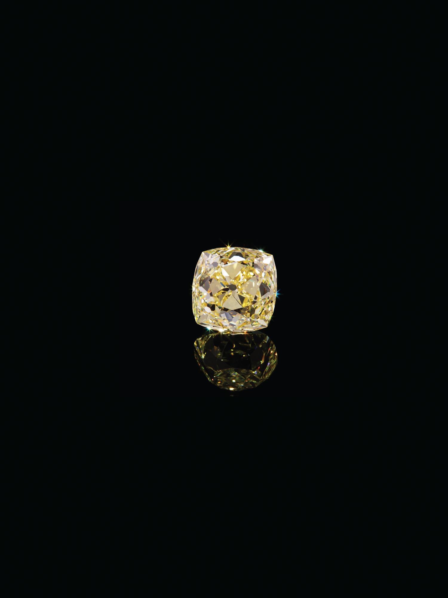 An Important 31.61 Carat Antique Cushion Cut Fancy Intense Yellow Diamond,