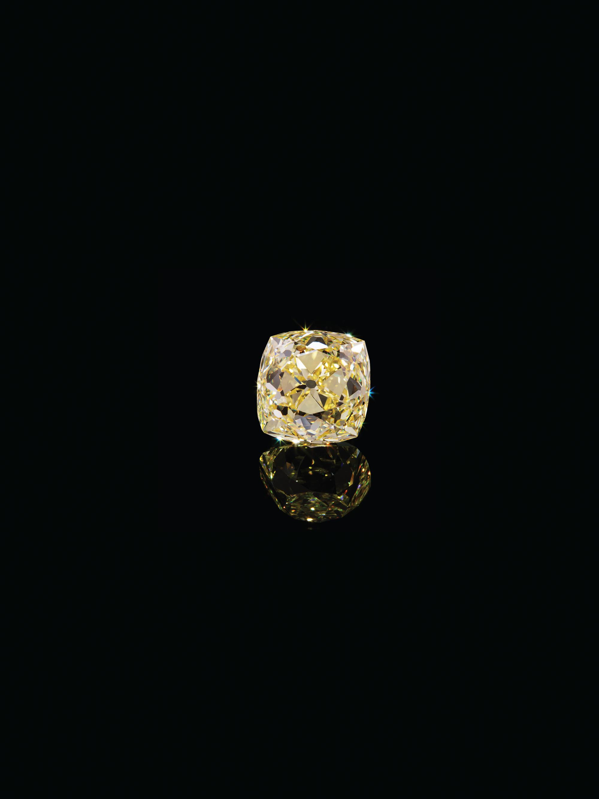 An Important 31.61 Carat Antique Cushion Cut Fancy Intense Yellow Diamond,