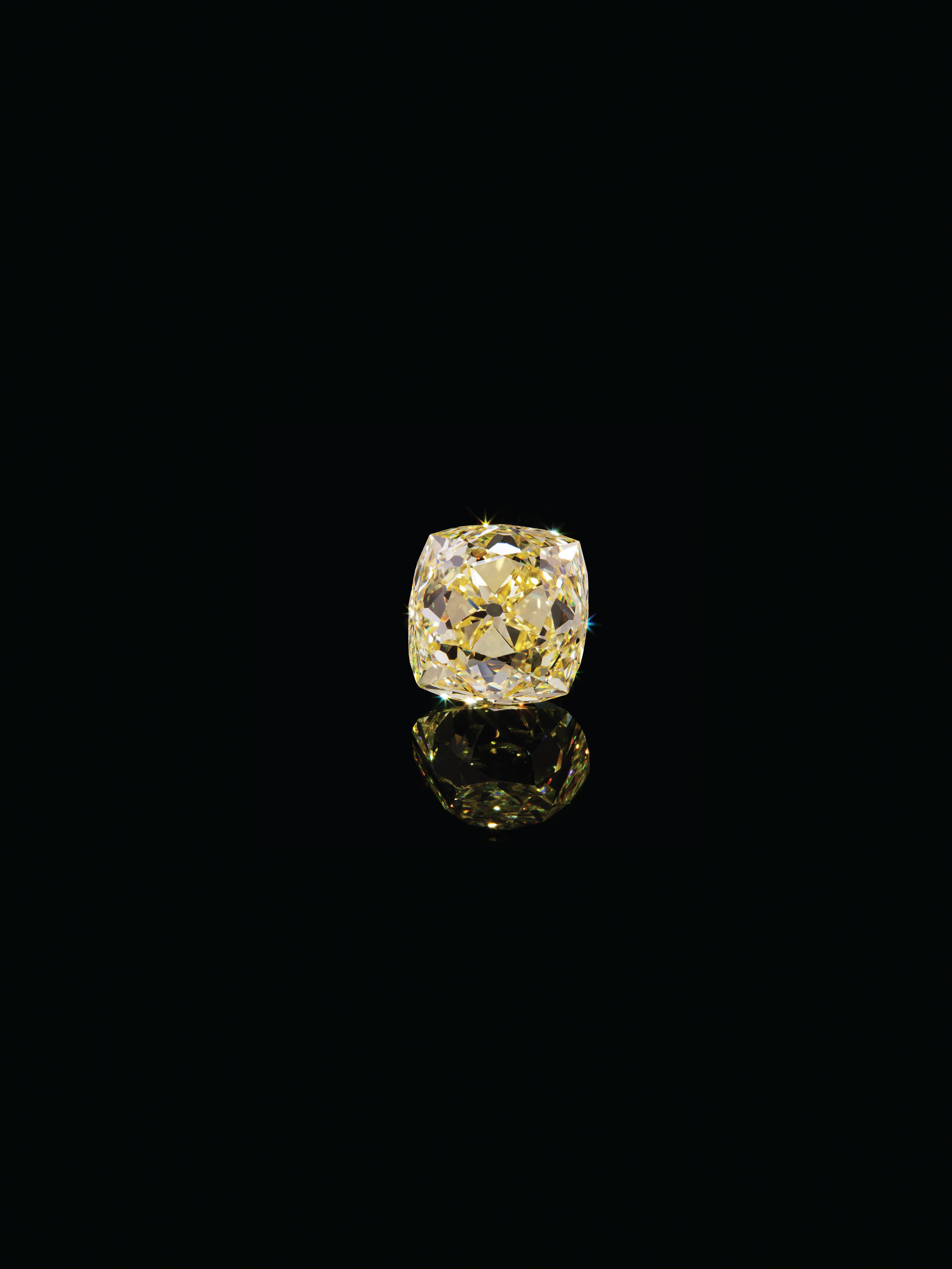 An Important 31.61 Carat Antique Cushion Cut Fancy Intense Yellow Diamond,