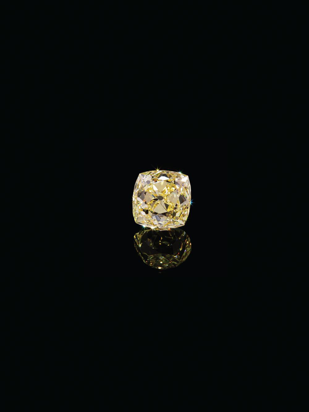 An Important 31.61 Carat Antique Cushion Cut Fancy Intense Yellow Diamond,