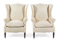 A Pair of Georgian Style Wingback Armchairs Height 39 inches. — 20TH CENTURY