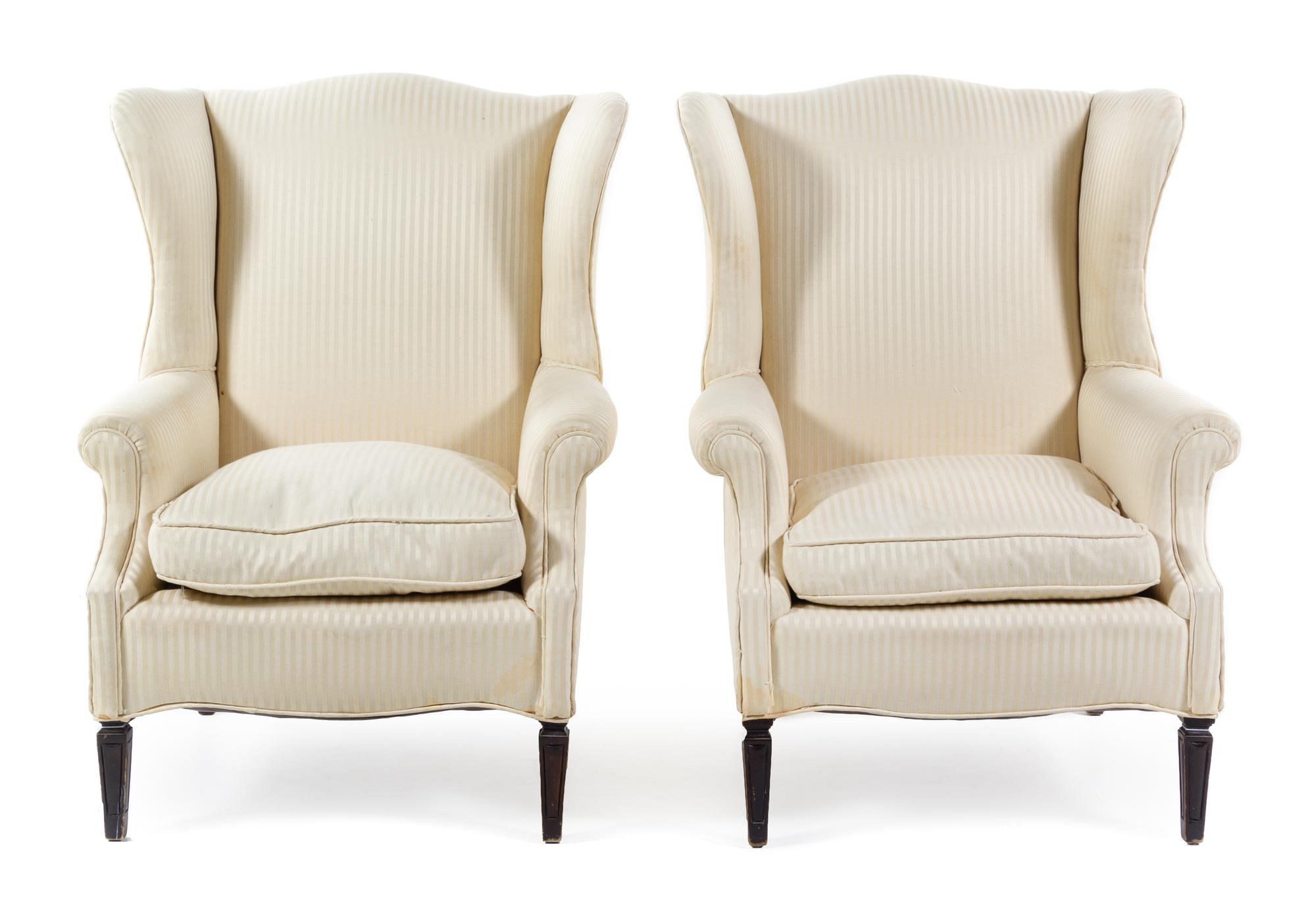 A Pair of Georgian Style Wingback Armchairs Height 39 inches. — 20TH CENTURY