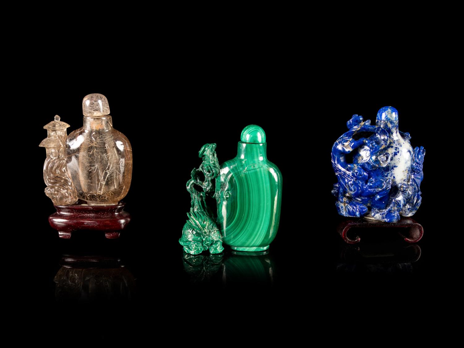 Three Chinese Hardstone Snuff Bottles