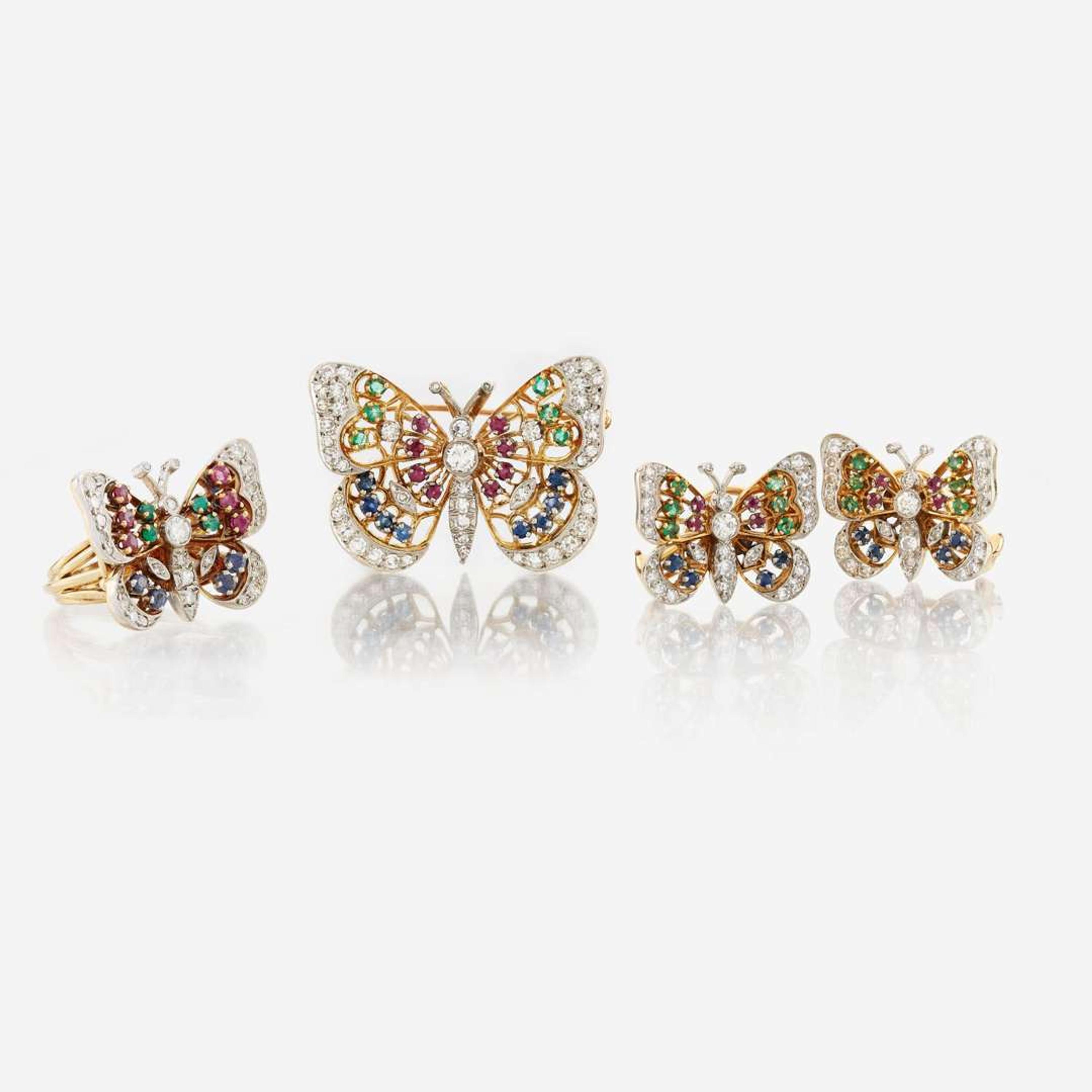 A platinum topped gold and gem-set suite