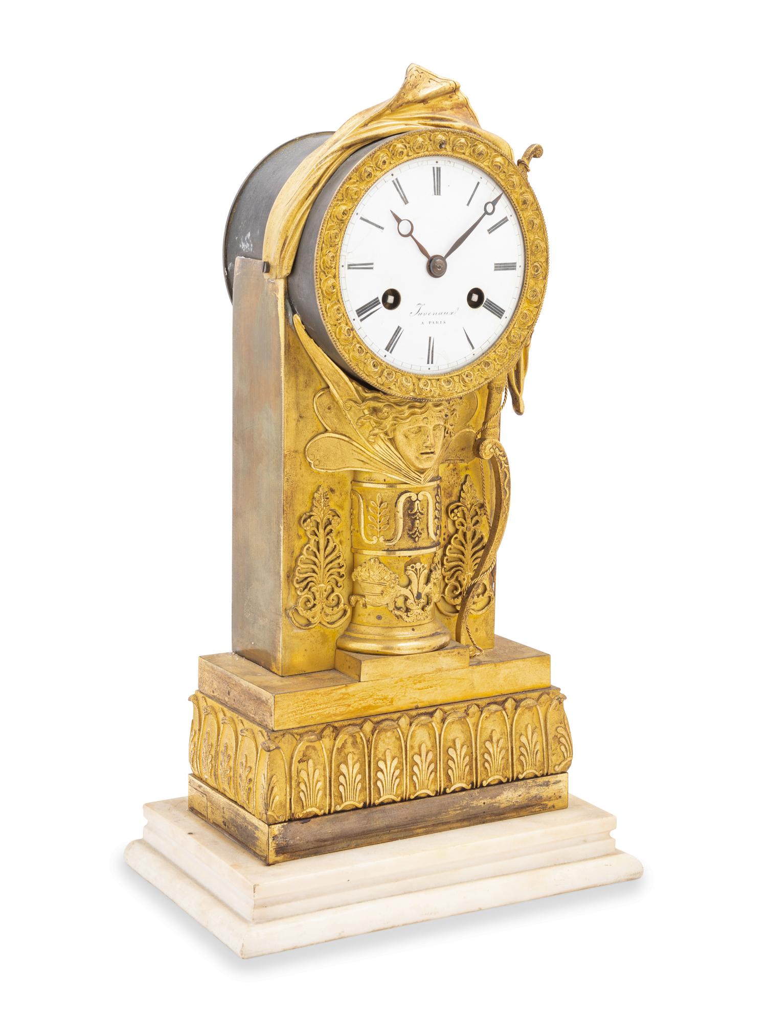 An Empire Gilt Bronze Clock