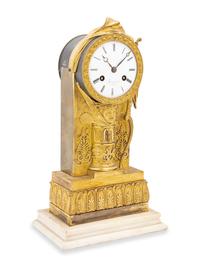 An Empire Gilt Bronze Clock