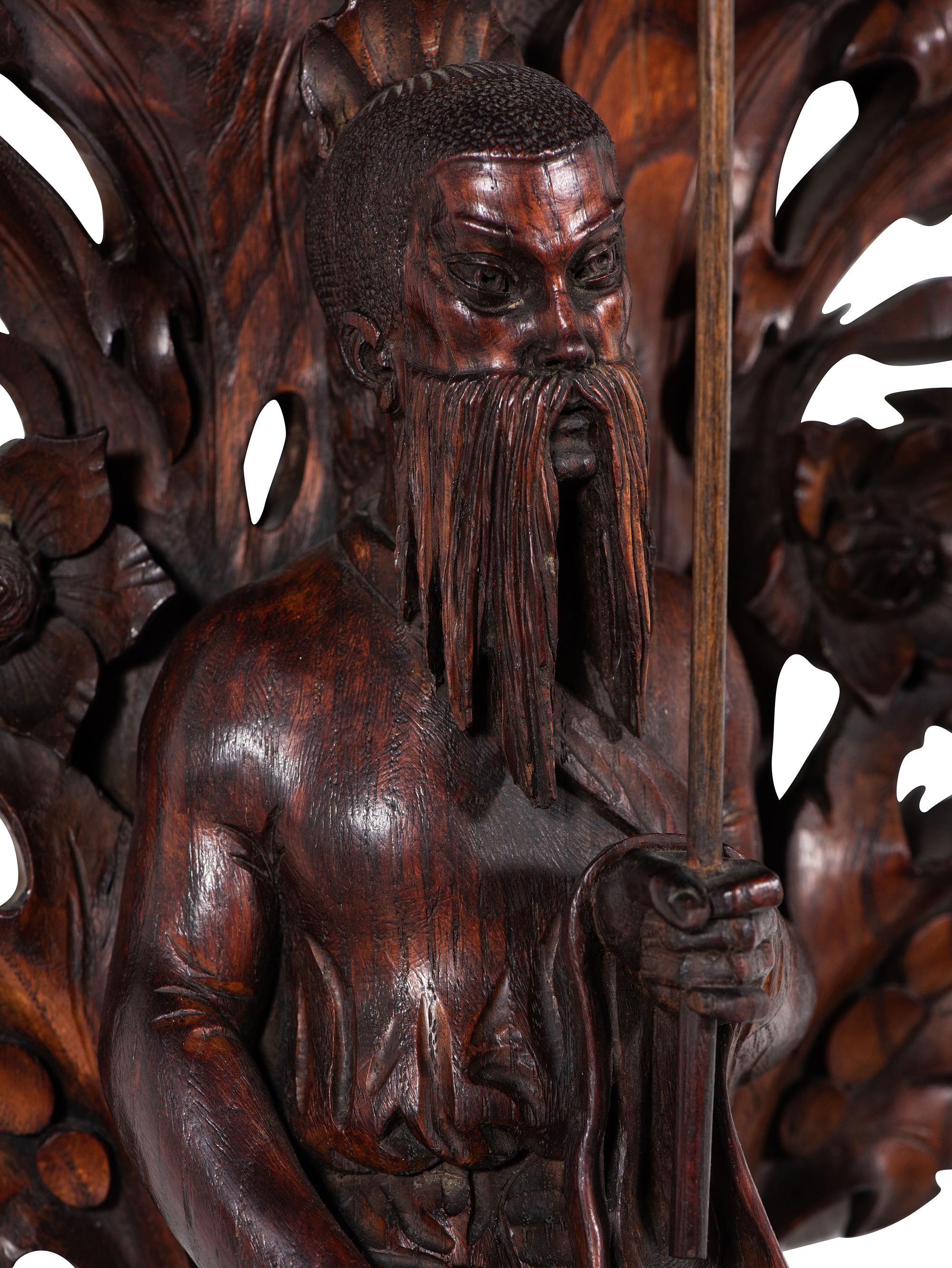 A Pair of Carved Oak Figural Wall Brackets