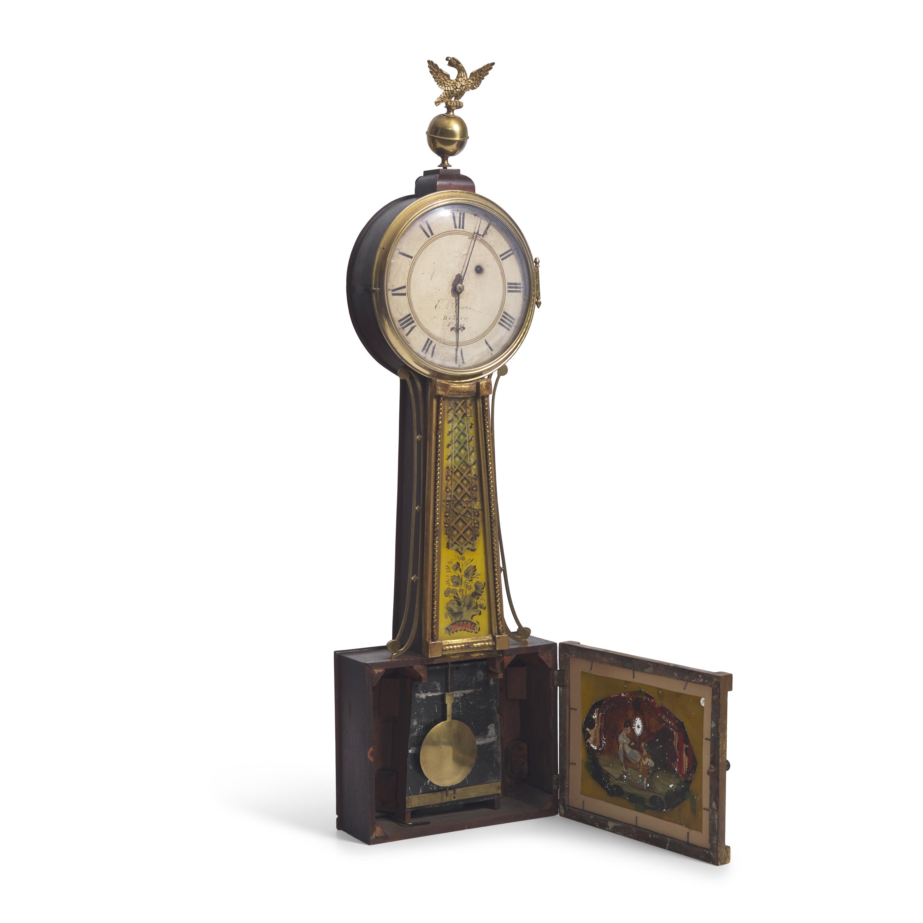 A Classical Parcel-Gilt, Brass-Mounted and Eglomise-Panel Inset Banjo Clock