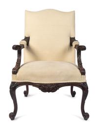 A George III Style Carved Mahogany Library Armchair — 19TH/20TH CENTURY