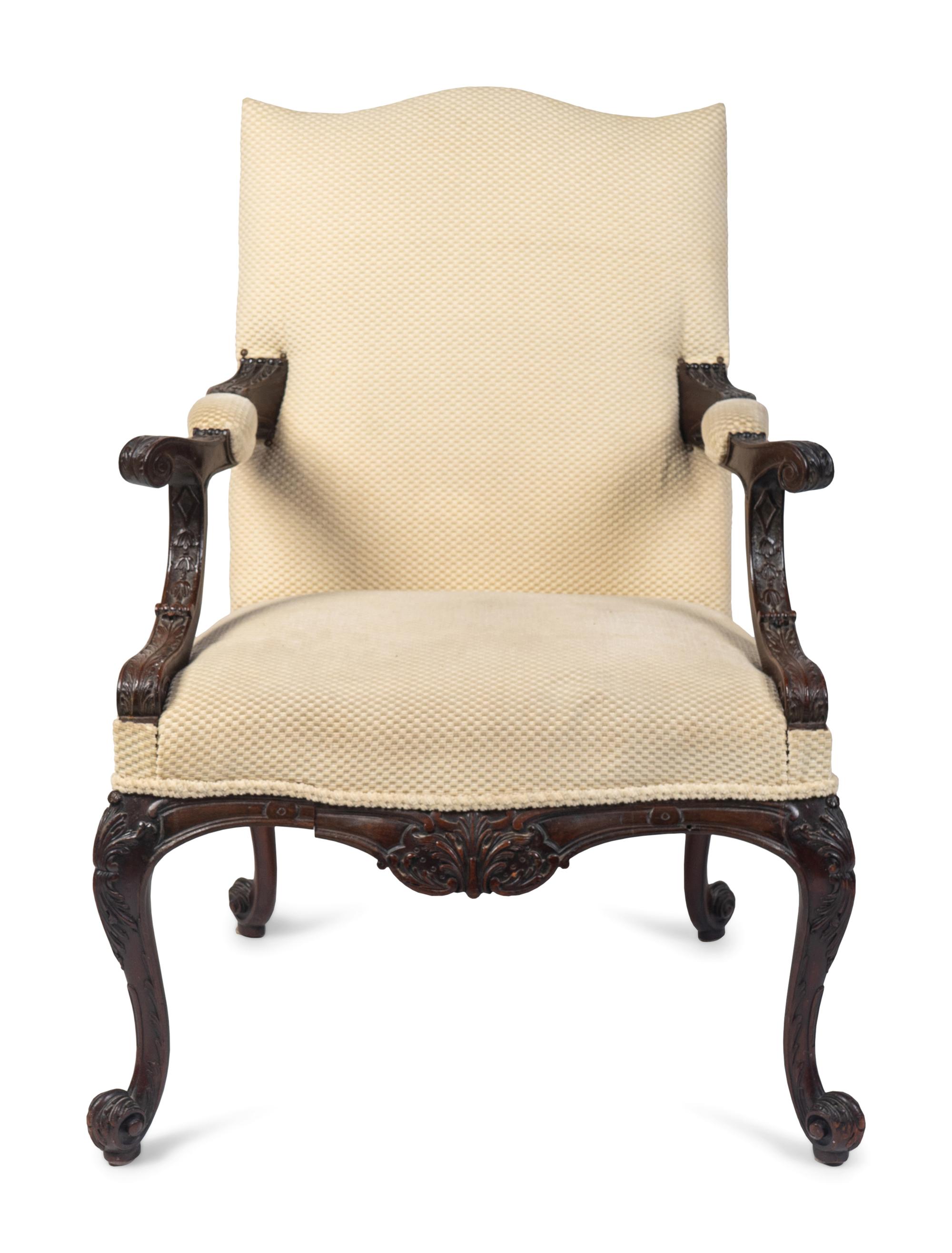 A George III Style Carved Mahogany Library Armchair — 19TH/20TH CENTURY