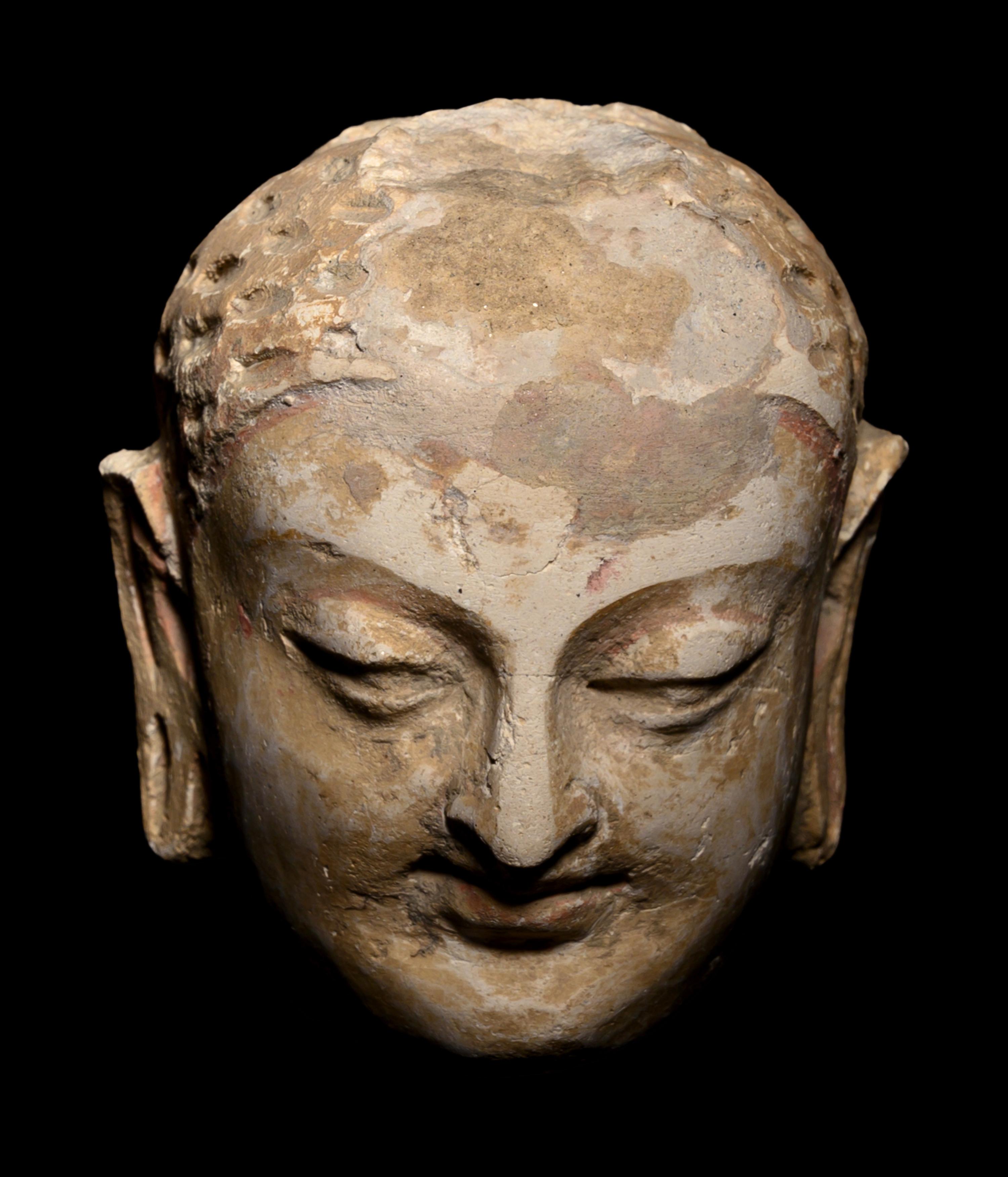 Three Gandharan Fragmentary Stucco Heads