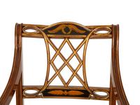 A Regency Style Rosewood and Parcel Gilt Open Armchair