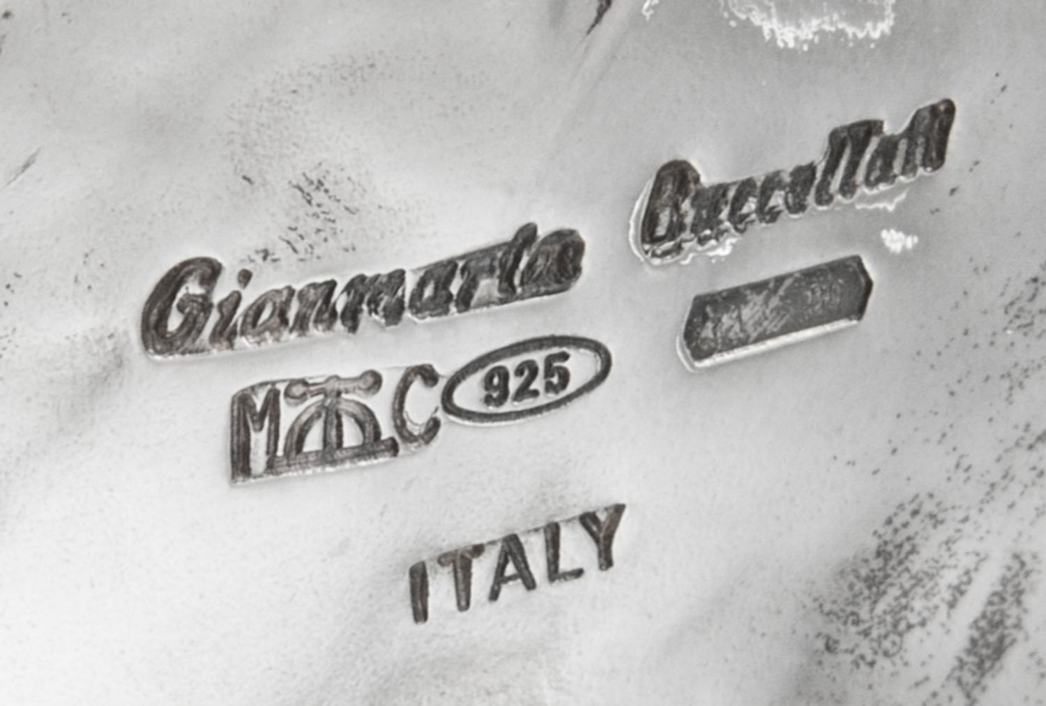 An Italian Silver Dish, Buccellati, Milan, Second Half 20th Century, in the form of a leaf, together with four silver-plate liquor tags