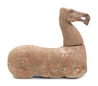 A Chinese Pottery Figure of a Recumbent Horse
