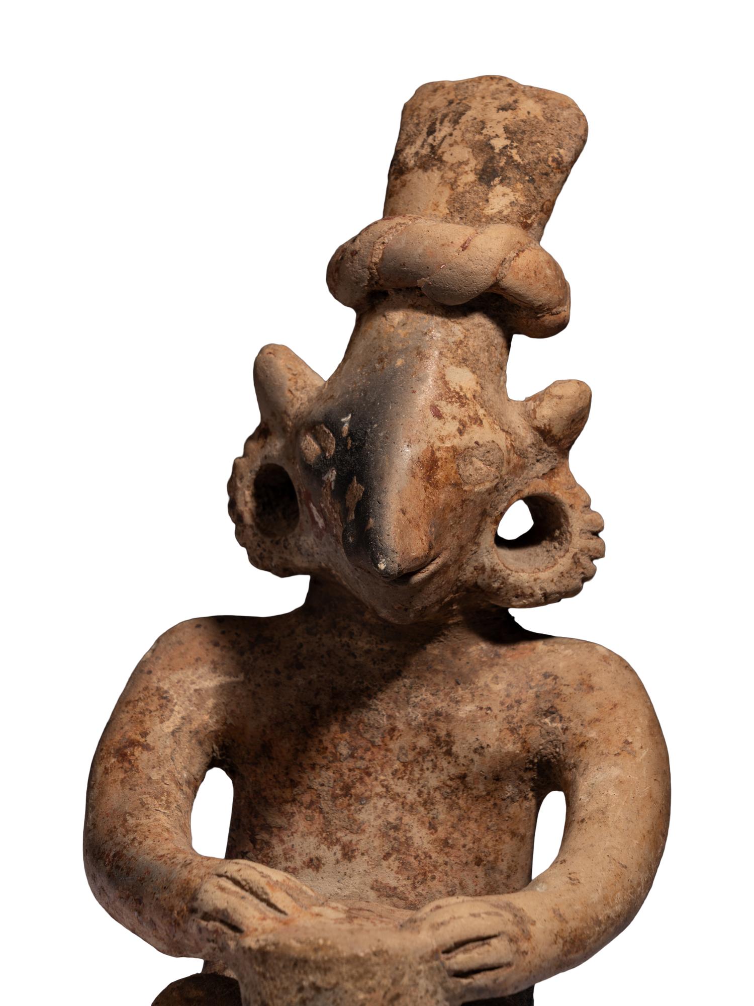 A Jalisco Terracotta Seated Drummer