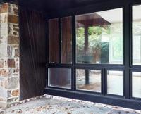 Undulating fireplace wall, 1954