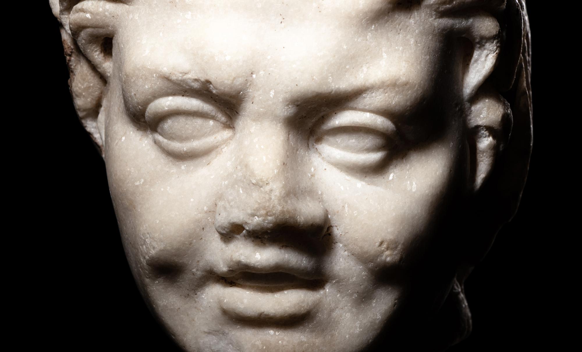 A Roman Marble Satyr Head