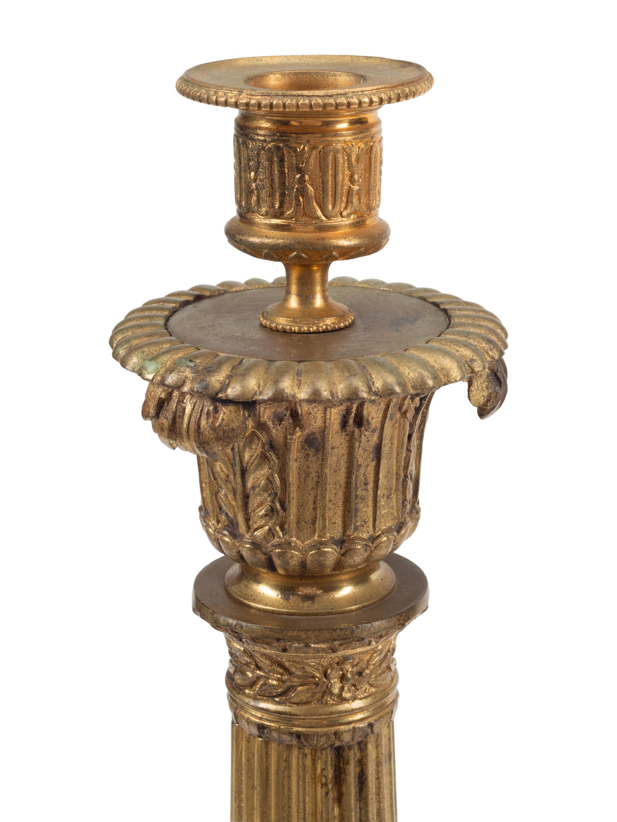 A Pair of French Gilt Bronze Candlesticks