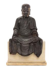 A Chinese Lacquered Wood Figure of a Luohan Height 13 inches. — LATE MING DYNASTY