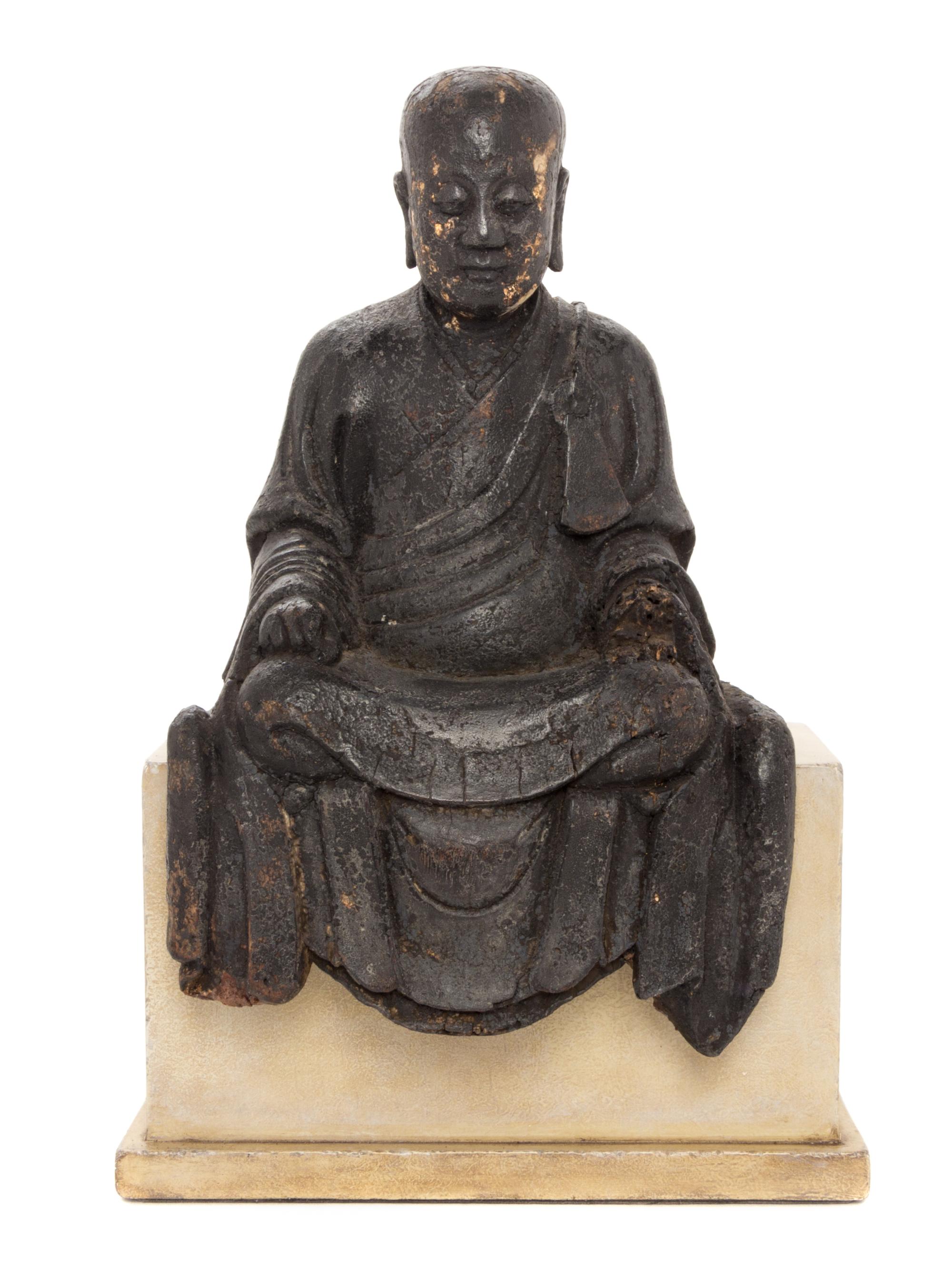 A Chinese Lacquered Wood Figure of a Luohan Height 13 inches. — LATE MING DYNASTY