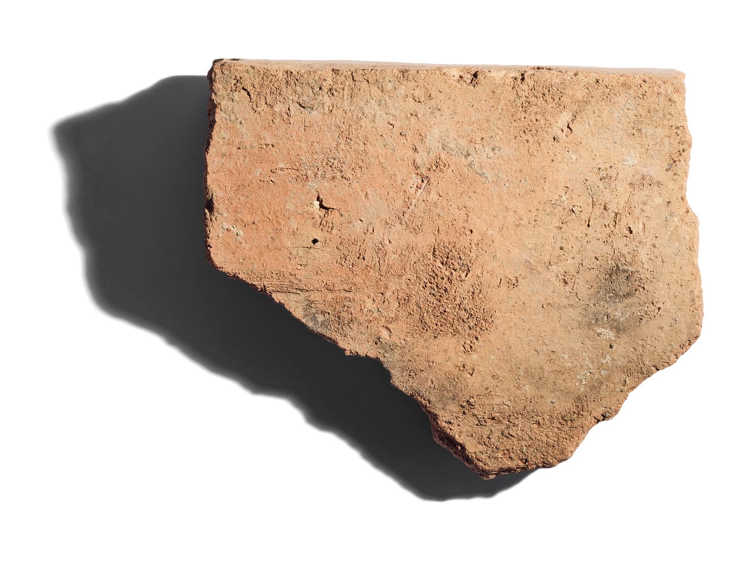 An Etruscan Painted Terracotta Relief Fragment