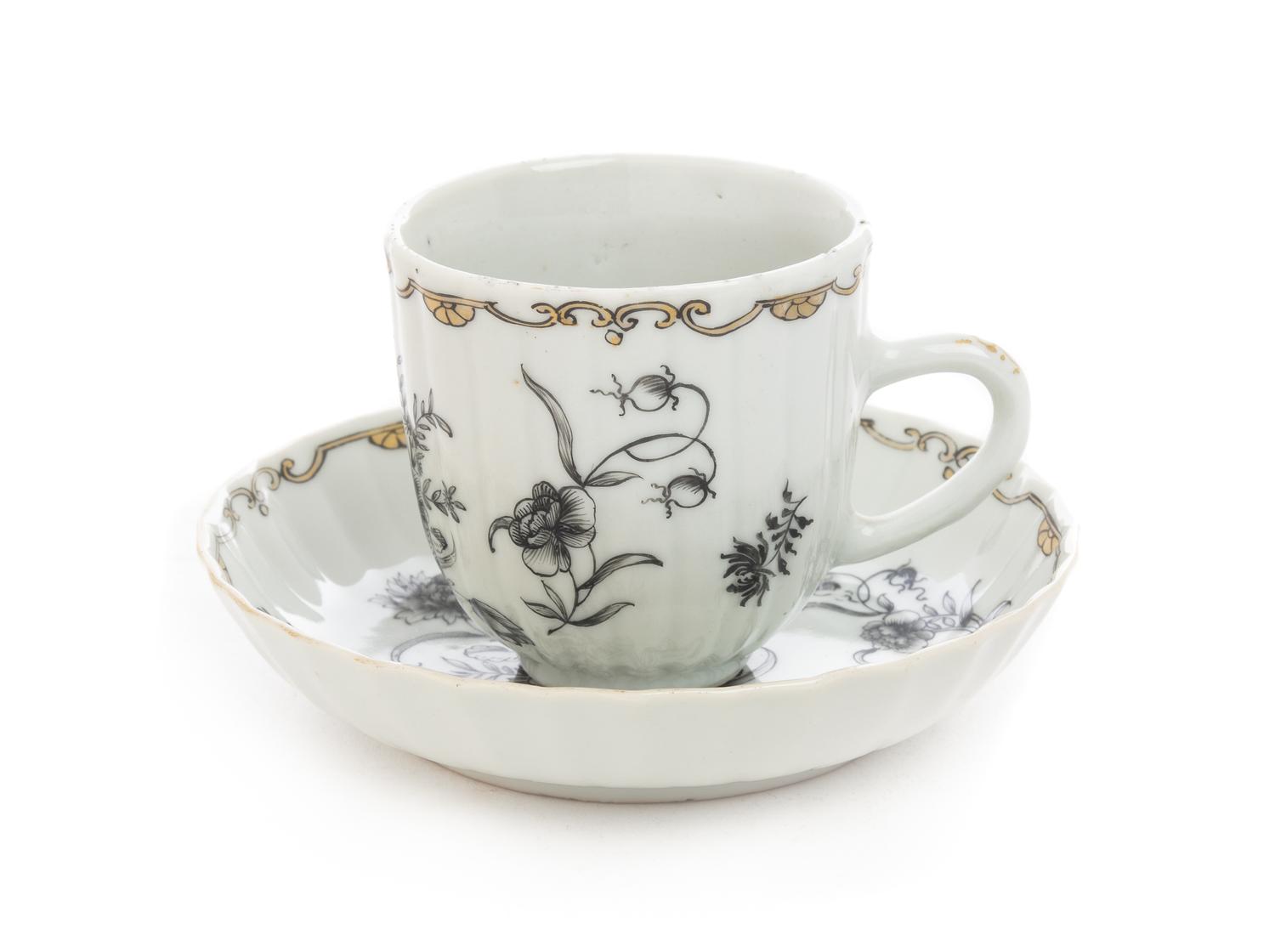 A Chinese Export Grisaille Porcelain Cup and Saucer Diameter of saucer 4 3/4 inches. — 19TH CENTURY