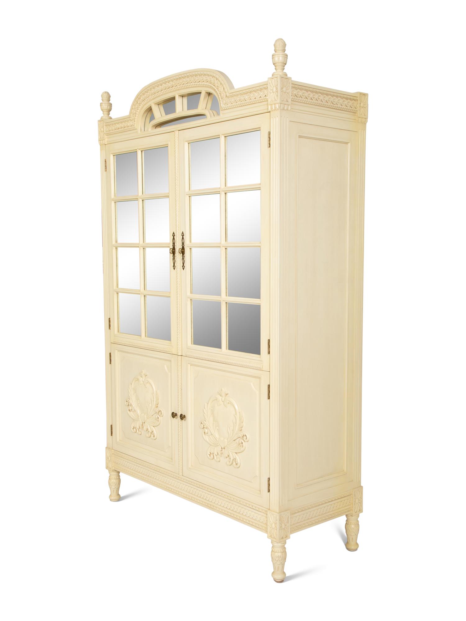 A Louis XVI Style White Painted Four-Door Armoire by Julia Gray, New York