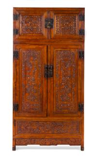 A Carved Hardwood Cabinet Height 79 x width 39 1/4 x depth 19 1/2 inches. — 20TH CENTURY