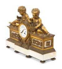 A Louis XV Style Gilt Bronze and Marble Mantel Clock