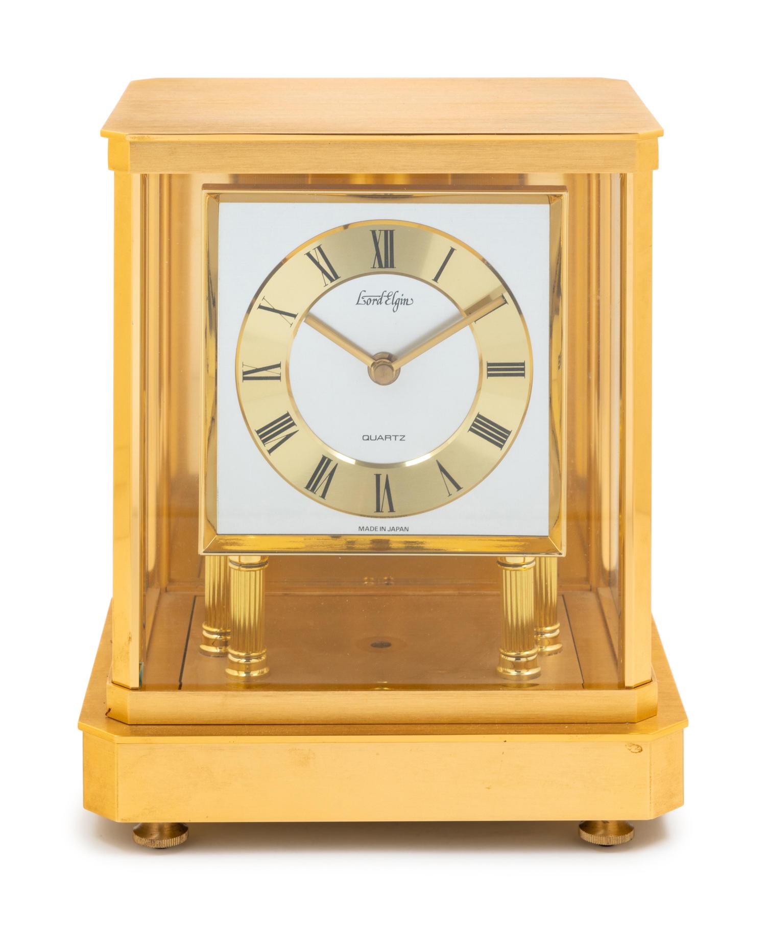 An Elgin Brass and Glass Mantel Clock