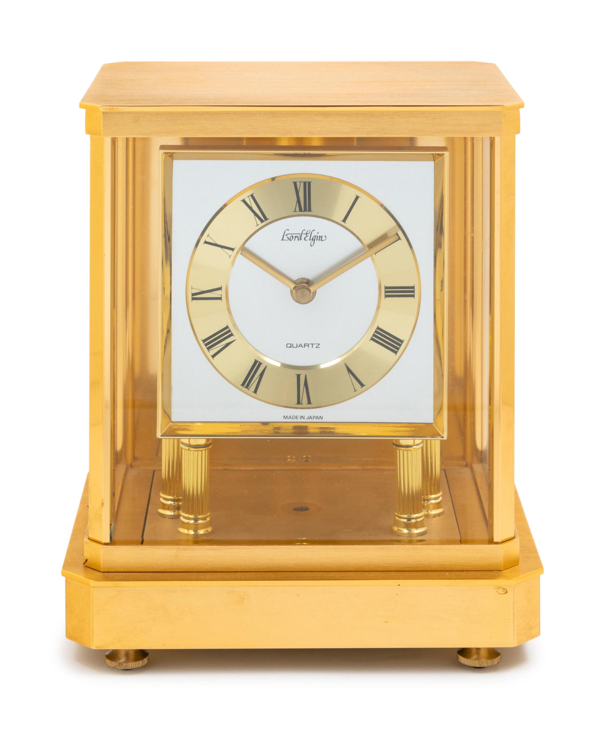 An Elgin Brass and Glass Mantel Clock