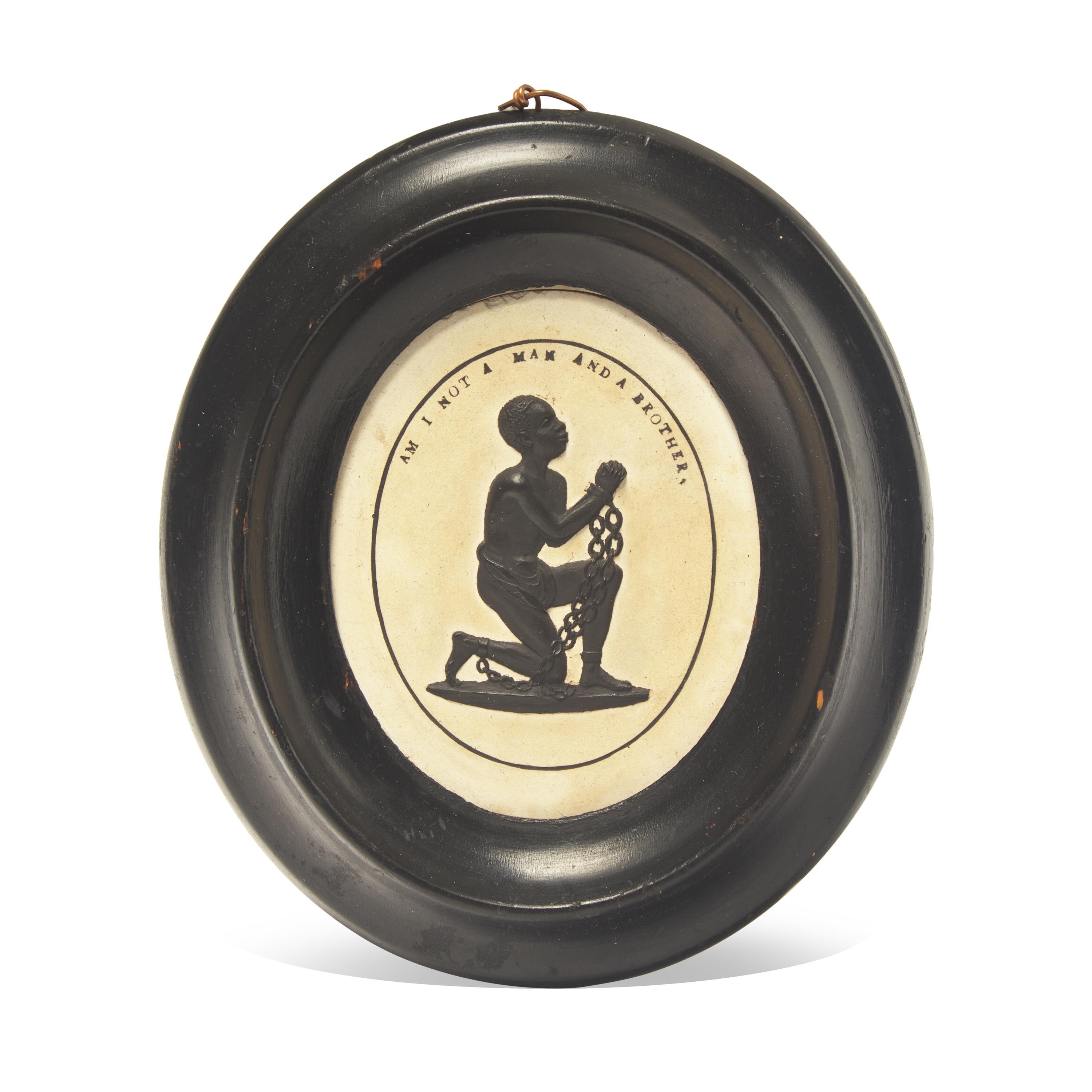 A Wedgwood Caneware and Black Basalt Oval Plaque: "Am I Not a Man and a Brother?"