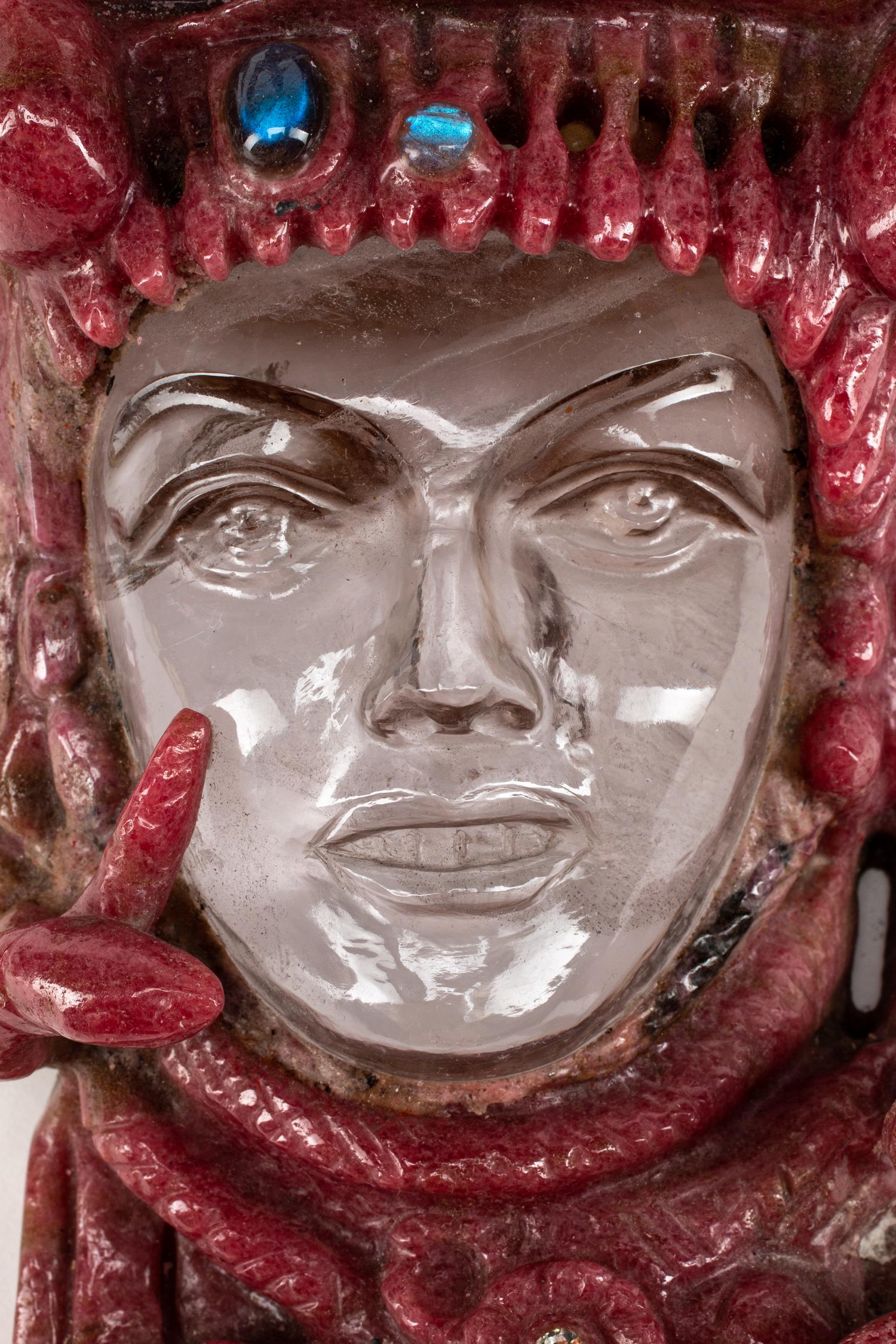 A Carved Rhodonite and Rock Crystal Medusa Mask