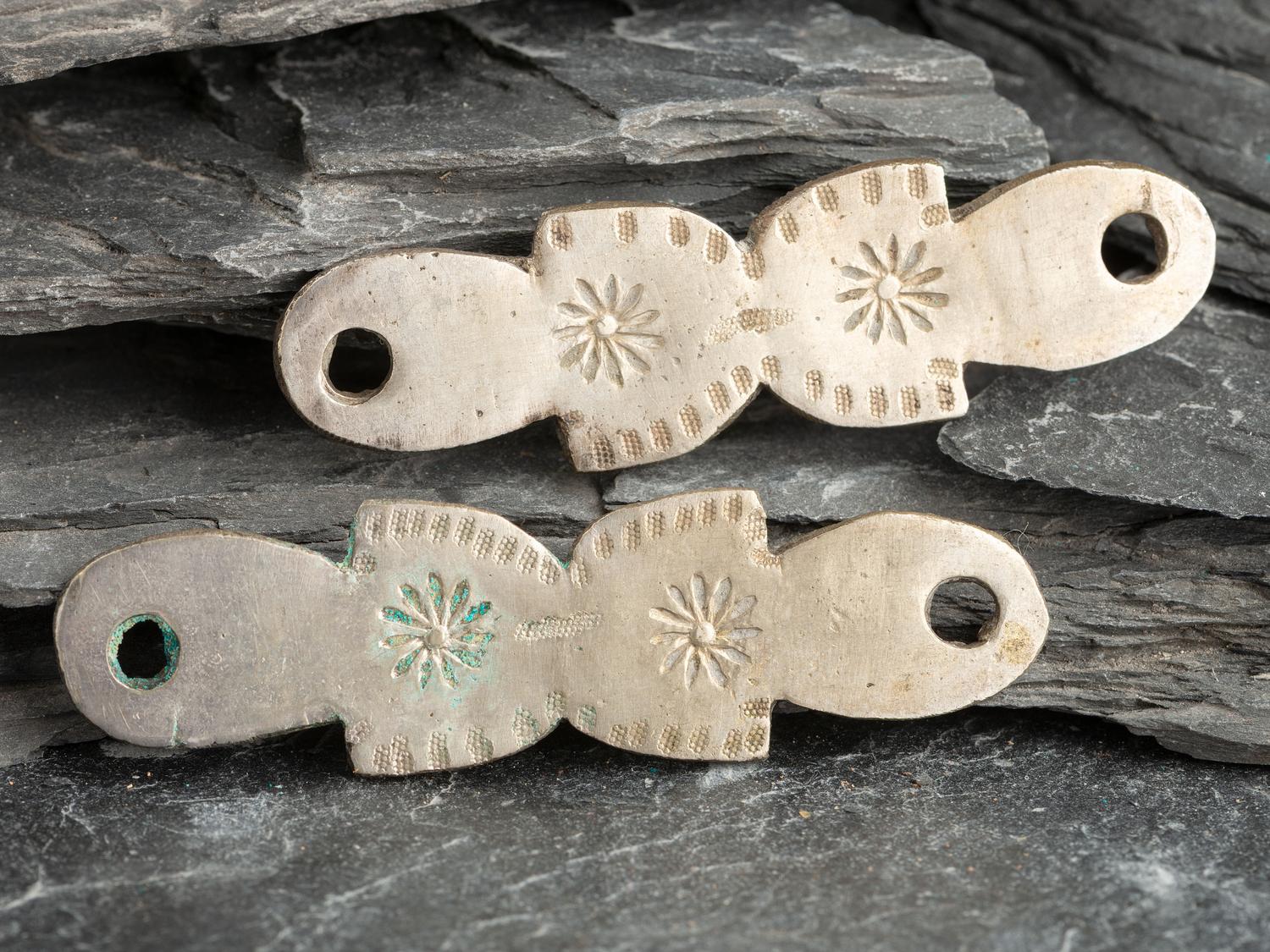 Pair of Matching Navajo or Pueblo Rocker Engraved Ingot Decorations